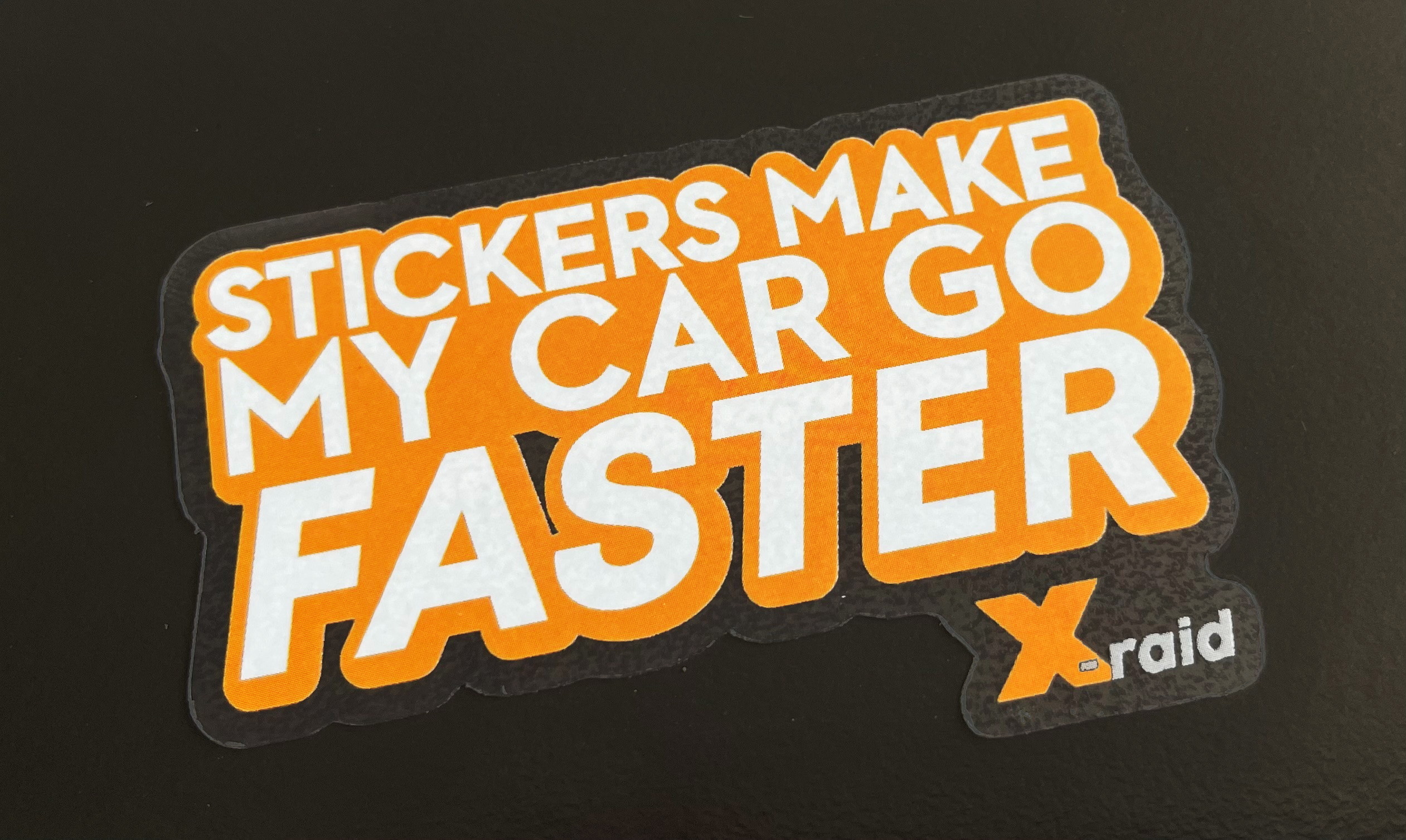 Sticker "Stickers make my car go faster" by X-raid